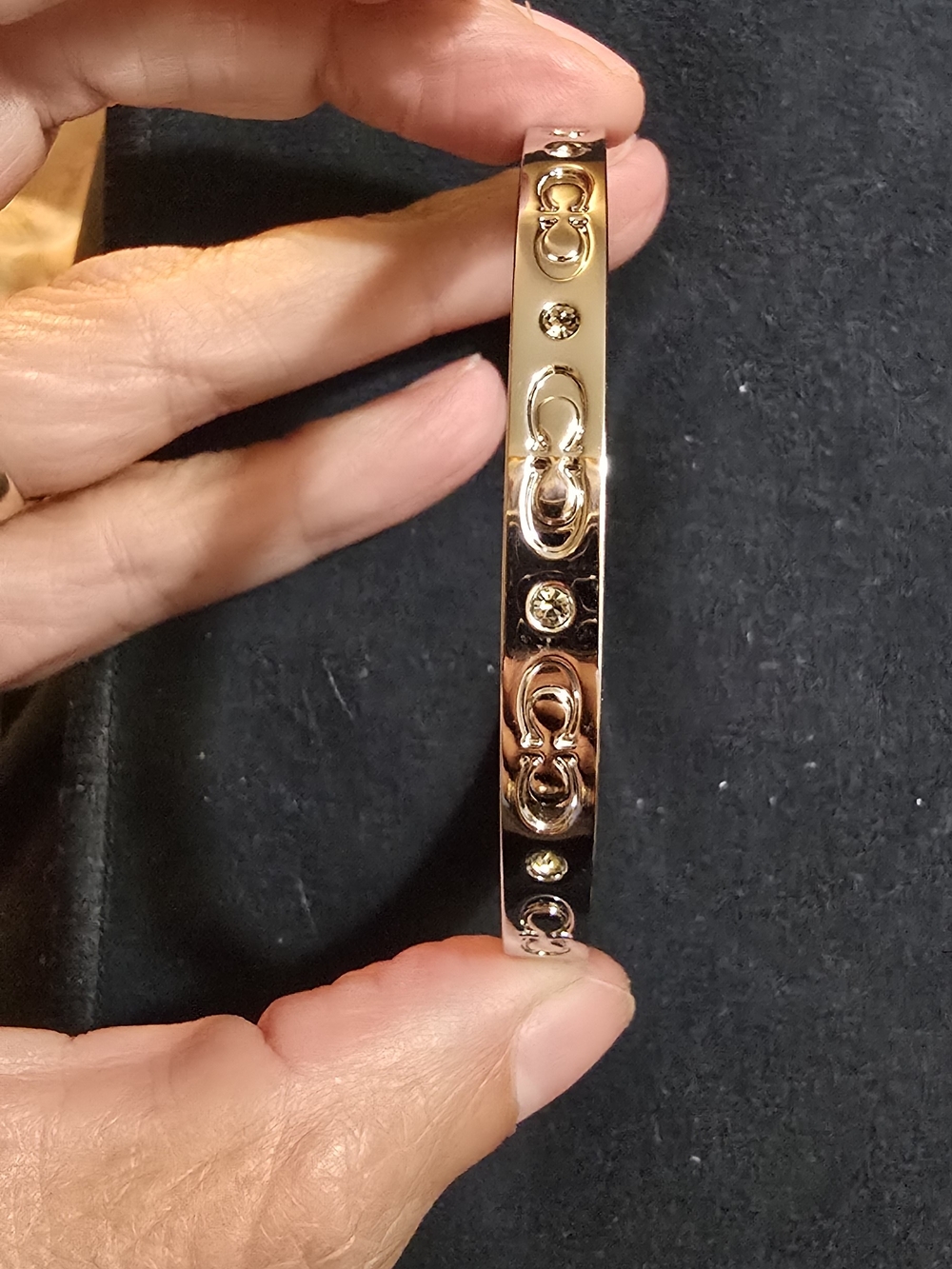 Coach Signature C hinged bangle bracelet
